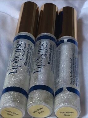 Lipsense by Senegence. Shade: Gold Glitter Gloss. NWT.